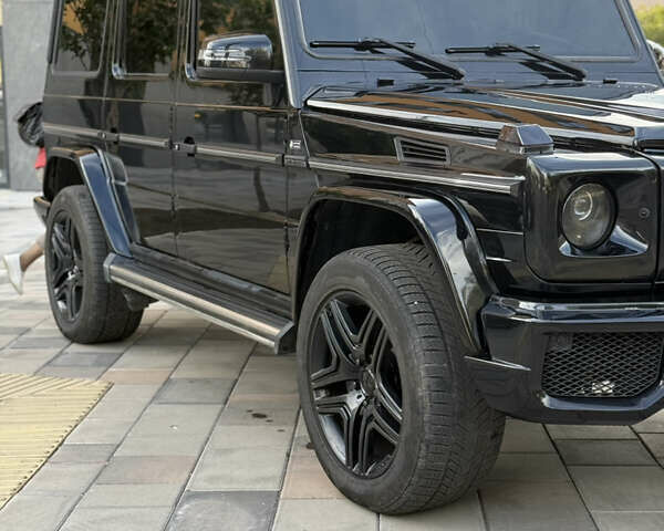 Черный Мерседес Г-Класс, объемом двигателя 5 л и пробегом 316 тыс. км за 27000 $, фото 4 на Automoto.ua