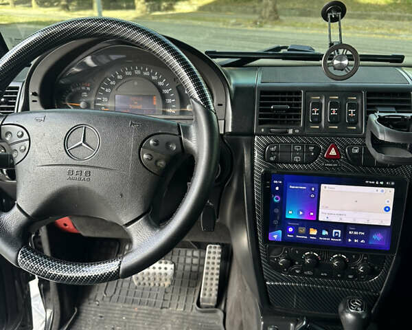 Черный Мерседес Г-Класс, объемом двигателя 5 л и пробегом 316 тыс. км за 27000 $, фото 6 на Automoto.ua