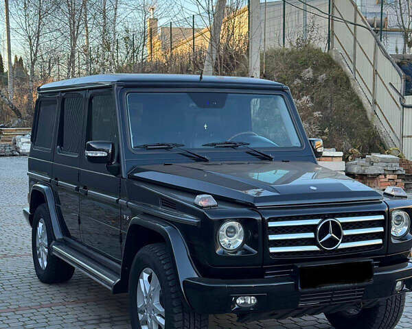 Черный Мерседес Г-Класс, объемом двигателя 5 л и пробегом 232 тыс. км за 34000 $, фото 2 на Automoto.ua