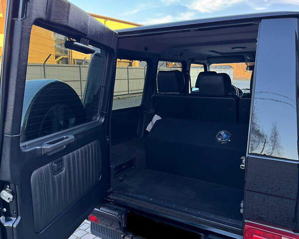 Черный Мерседес Г-Класс, объемом двигателя 5 л и пробегом 232 тыс. км за 34000 $, фото 7 на Automoto.ua