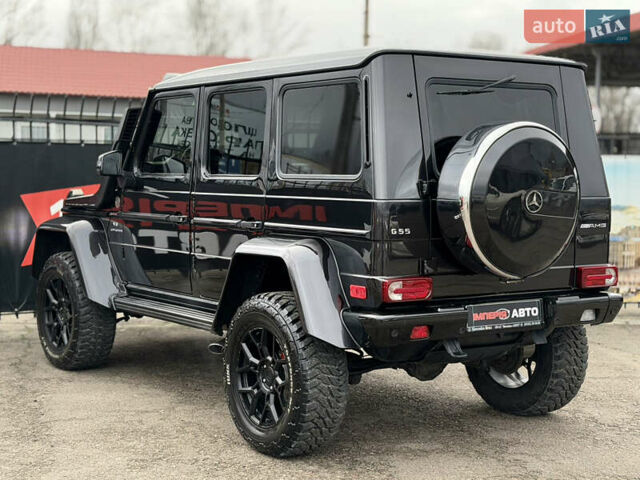 Черный Мерседес Г-Класс, объемом двигателя 5.44 л и пробегом 198 тыс. км за 30000 $, фото 5 на Automoto.ua