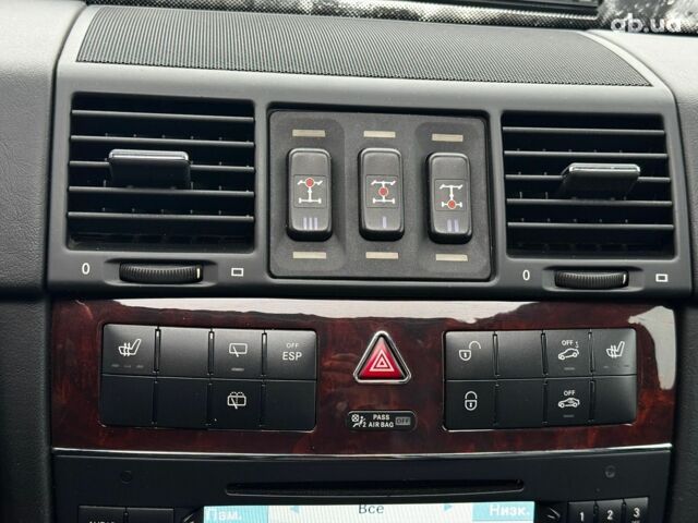 Чорний Мерседес Г-Клас, об'ємом двигуна 5 л та пробігом 98 тис. км за 31690 $, фото 24 на Automoto.ua