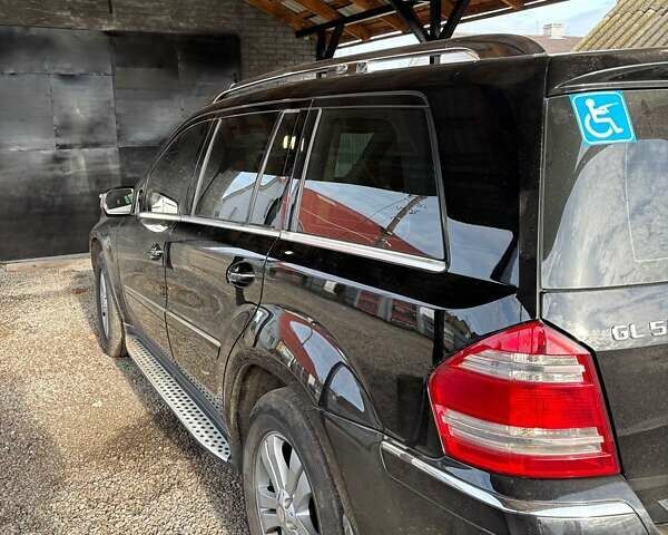 Черный Мерседес ГЛ-класс, объемом двигателя 5.46 л и пробегом 335 тыс. км за 13500 $, фото 12 на Automoto.ua