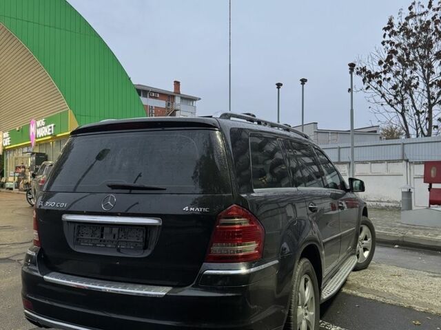 Черный Мерседес ГЛ-класс, объемом двигателя 3 л и пробегом 233 тыс. км за 16800 $, фото 1 на Automoto.ua