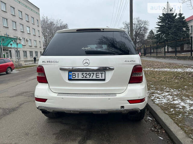 Білий Мерседес М-Клас, об'ємом двигуна 3 л та пробігом 235 тис. км за 14000 $, фото 4 на Automoto.ua