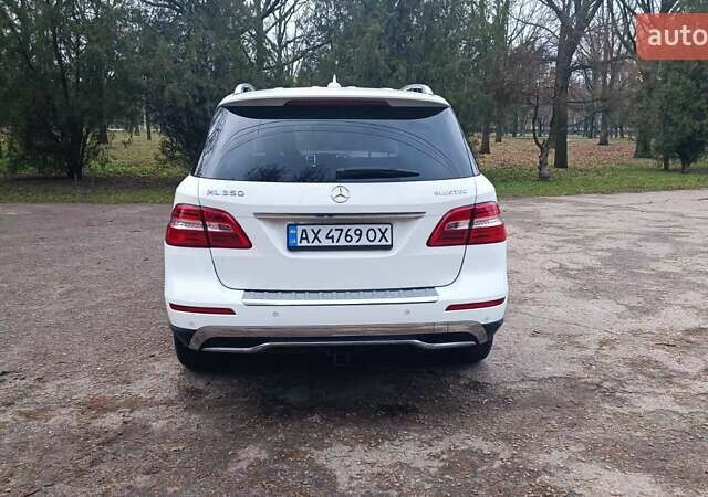 Белый Мерседес М-Класс, объемом двигателя 3 л и пробегом 228 тыс. км за 23000 $, фото 15 на Automoto.ua