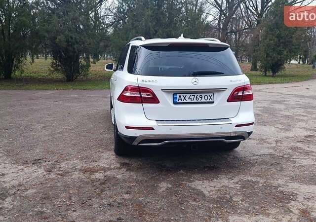 Белый Мерседес М-Класс, объемом двигателя 3 л и пробегом 228 тыс. км за 23000 $, фото 14 на Automoto.ua