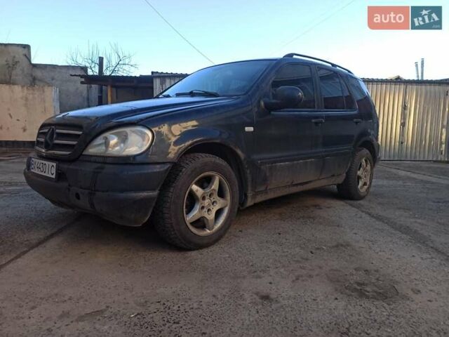 Черный Мерседес М-Класс, объемом двигателя 3.2 л и пробегом 383 тыс. км за 3680 $, фото 1 на Automoto.ua