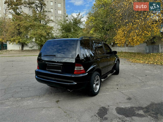 Черный Мерседес М-Класс, объемом двигателя 3.2 л и пробегом 329 тыс. км за 6700 $, фото 2 на Automoto.ua