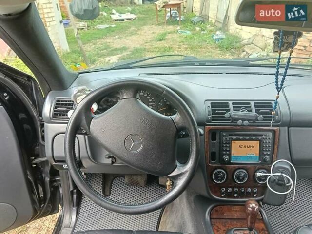 Чорний Мерседес М-Клас, об'ємом двигуна 4 л та пробігом 233 тис. км за 5200 $, фото 6 на Automoto.ua