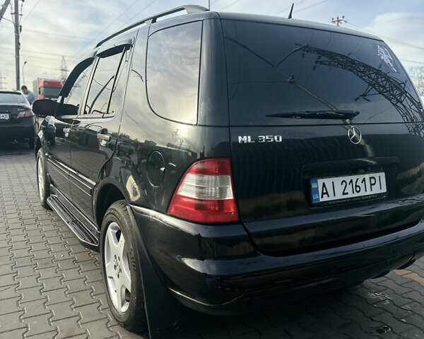 Черный Мерседес М-Класс, объемом двигателя 3.72 л и пробегом 300 тыс. км за 7700 $, фото 5 на Automoto.ua