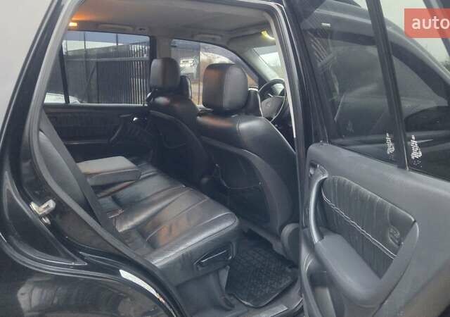 Черный Мерседес М-Класс, объемом двигателя 4 л и пробегом 343 тыс. км за 5250 $, фото 16 на Automoto.ua