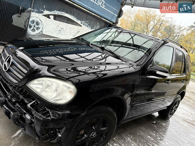 Черный Мерседес М-Класс, объемом двигателя 3.5 л и пробегом 230 тыс. км за 7500 $, фото 13 на Automoto.ua