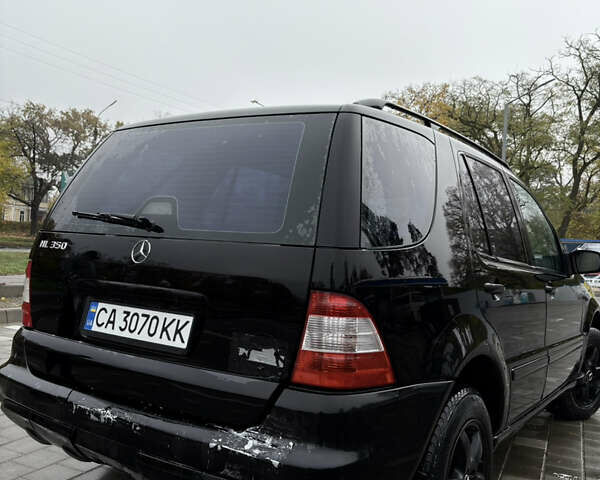 Черный Мерседес М-Класс, объемом двигателя 3.5 л и пробегом 230 тыс. км за 7500 $, фото 5 на Automoto.ua