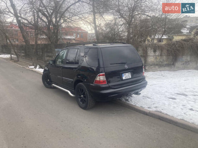 Черный Мерседес М-Класс, объемом двигателя 3.72 л и пробегом 240 тыс. км за 9000 $, фото 3 на Automoto.ua