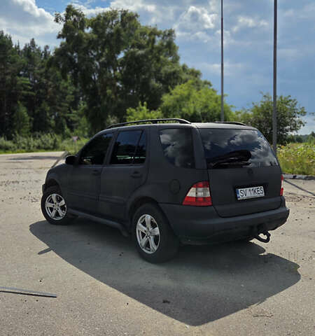 Чорний Мерседес М-Клас, об'ємом двигуна 4 л та пробігом 292 тис. км за 4999 $, фото 5 на Automoto.ua