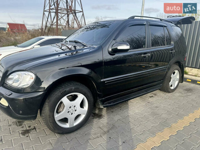 Черный Мерседес М-Класс, объемом двигателя 3.72 л и пробегом 300 тыс. км за 7700 $, фото 4 на Automoto.ua