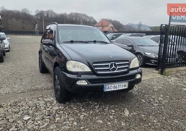 Черный Мерседес М-Класс, объемом двигателя 4 л и пробегом 343 тыс. км за 5250 $, фото 5 на Automoto.ua