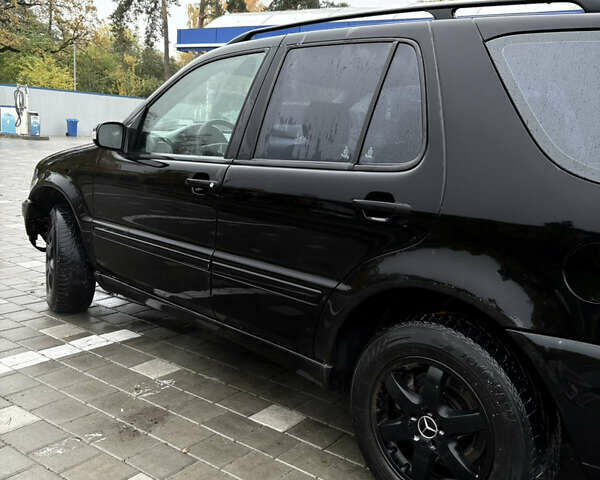 Черный Мерседес М-Класс, объемом двигателя 3.5 л и пробегом 230 тыс. км за 7500 $, фото 3 на Automoto.ua