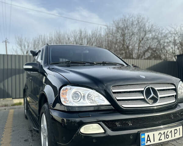 Черный Мерседес М-Класс, объемом двигателя 3.72 л и пробегом 300 тыс. км за 7700 $, фото 2 на Automoto.ua