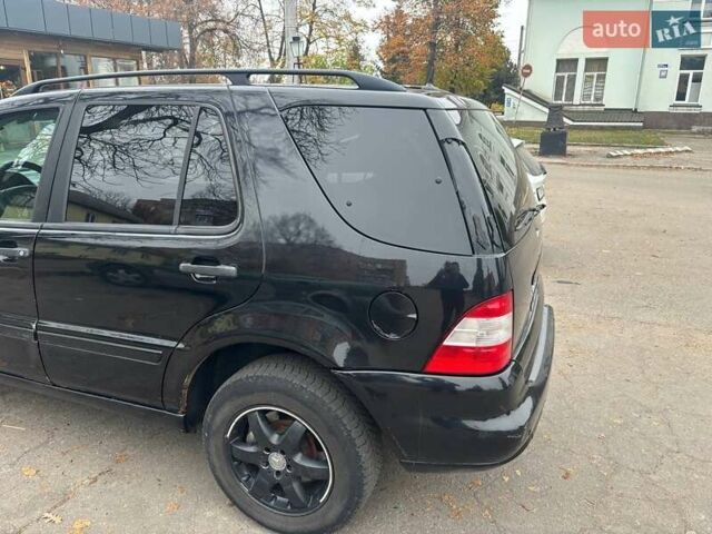 Черный Мерседес М-Класс, объемом двигателя 2.7 л и пробегом 382 тыс. км за 4900 $, фото 17 на Automoto.ua