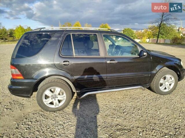 Чорний Мерседес М-Клас, об'ємом двигуна 4 л та пробігом 304 тис. км за 6900 $, фото 27 на Automoto.ua