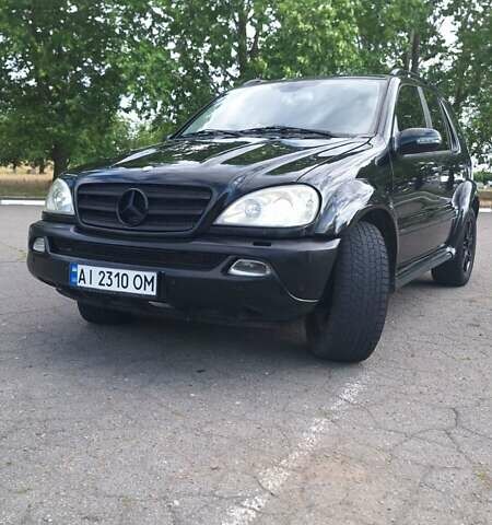 Черный Мерседес М-Класс, объемом двигателя 3.7 л и пробегом 322 тыс. км за 6000 $, фото 1 на Automoto.ua