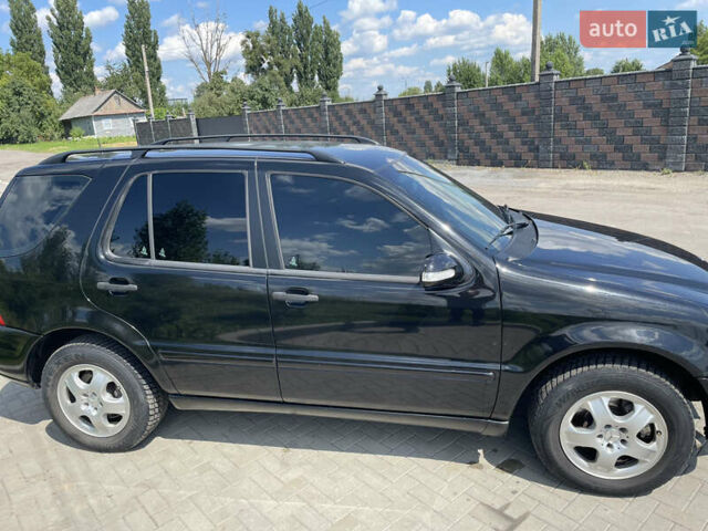 Черный Мерседес М-Класс, объемом двигателя 2.69 л и пробегом 425 тыс. км за 5300 $, фото 2 на Automoto.ua