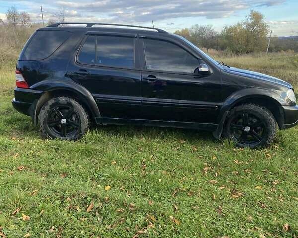 Черный Мерседес М-Класс, объемом двигателя 2.69 л и пробегом 345 тыс. км за 8200 $, фото 1 на Automoto.ua