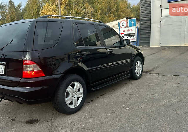 Чорний Мерседес М-Клас, об'ємом двигуна 3.72 л та пробігом 224 тис. км за 8999 $, фото 5 на Automoto.ua