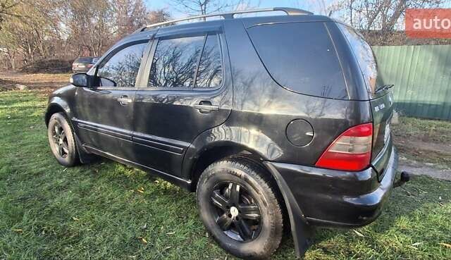 Черный Мерседес М-Класс, объемом двигателя 3.72 л и пробегом 398 тыс. км за 6000 $, фото 3 на Automoto.ua