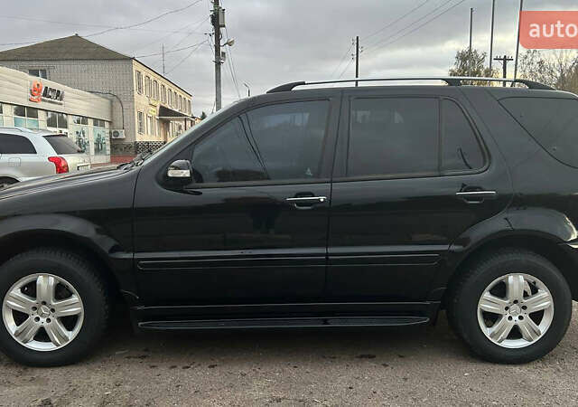 Чорний Мерседес М-Клас, об'ємом двигуна 3.72 л та пробігом 224 тис. км за 8999 $, фото 2 на Automoto.ua