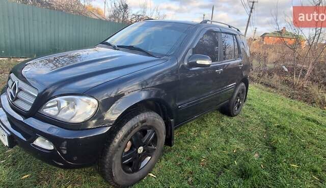 Черный Мерседес М-Класс, объемом двигателя 3.72 л и пробегом 398 тыс. км за 6000 $, фото 2 на Automoto.ua