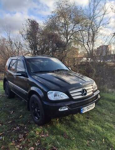 Черный Мерседес М-Класс, объемом двигателя 3.72 л и пробегом 398 тыс. км за 6000 $, фото 1 на Automoto.ua