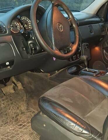 Черный Мерседес М-Класс, объемом двигателя 3.72 л и пробегом 398 тыс. км за 6000 $, фото 6 на Automoto.ua