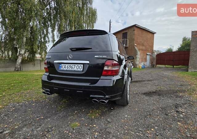 Чорний Мерседес М-Клас, об'ємом двигуна 6.2 л та пробігом 286 тис. км за 10599 $, фото 16 на Automoto.ua