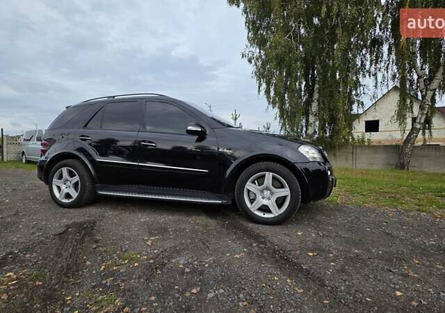 Чорний Мерседес М-Клас, об'ємом двигуна 6.2 л та пробігом 286 тис. км за 10599 $, фото 7 на Automoto.ua