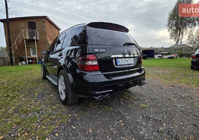 Чорний Мерседес М-Клас, об'ємом двигуна 6.2 л та пробігом 286 тис. км за 10599 $, фото 12 на Automoto.ua