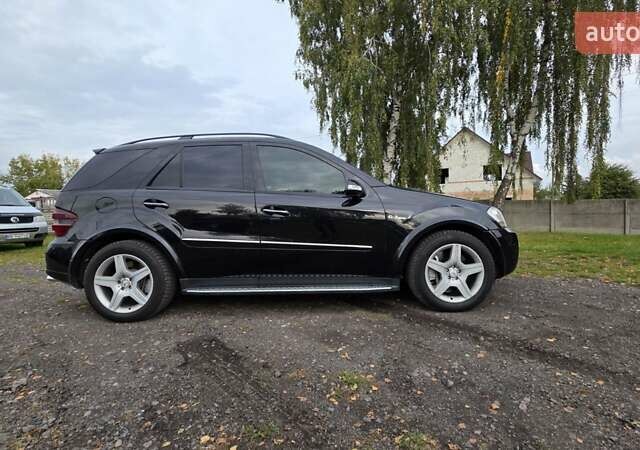 Чорний Мерседес М-Клас, об'ємом двигуна 6.2 л та пробігом 286 тис. км за 10599 $, фото 6 на Automoto.ua