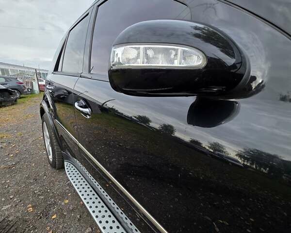 Чорний Мерседес М-Клас, об'ємом двигуна 6.2 л та пробігом 286 тис. км за 10599 $, фото 3 на Automoto.ua