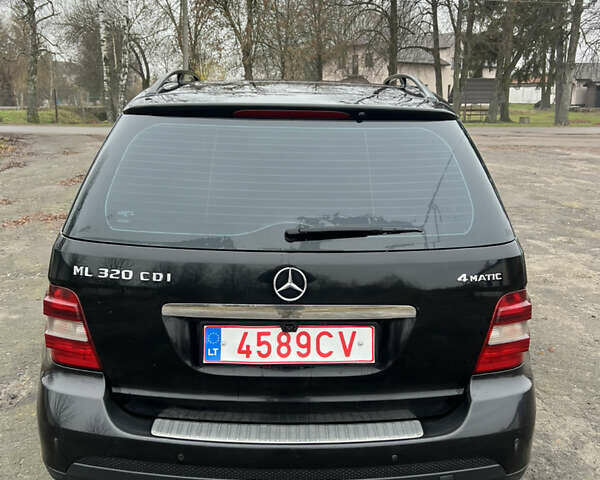 Черный Мерседес М-Класс, объемом двигателя 3 л и пробегом 300 тыс. км за 6599 $, фото 8 на Automoto.ua