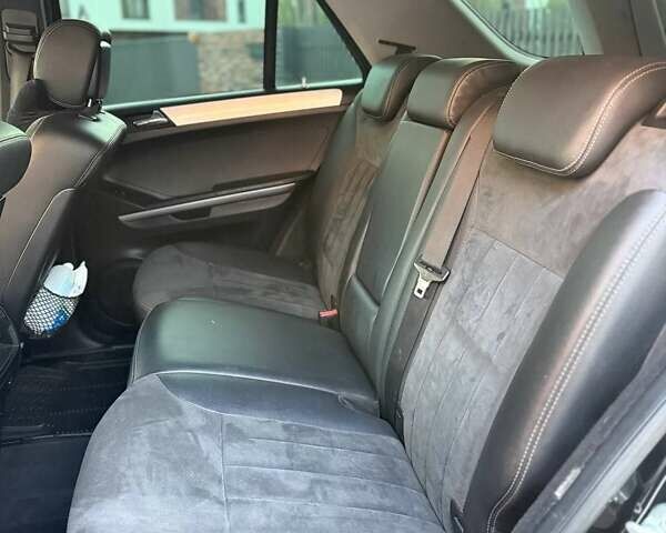 Черный Мерседес М-Класс, объемом двигателя 3.5 л и пробегом 293 тыс. км за 8300 $, фото 11 на Automoto.ua