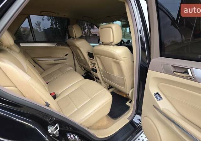 Чорний Мерседес М-Клас, об'ємом двигуна 6.2 л та пробігом 286 тис. км за 10599 $, фото 29 на Automoto.ua