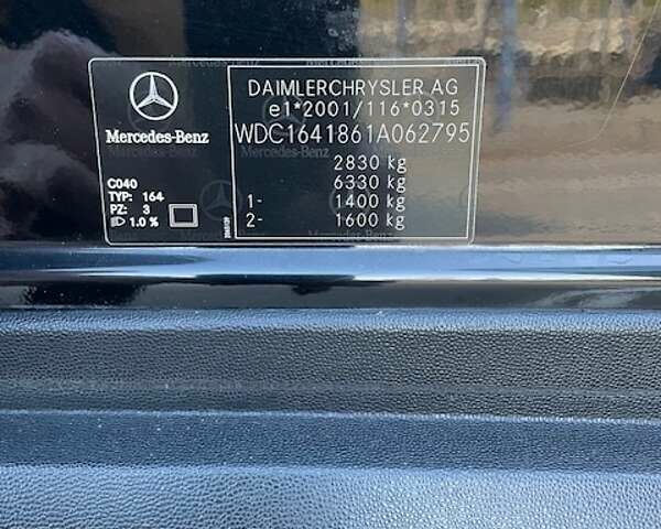 Черный Мерседес М-Класс, объемом двигателя 3.5 л и пробегом 292 тыс. км за 12300 $, фото 13 на Automoto.ua