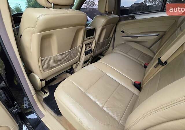 Чорний Мерседес М-Клас, об'ємом двигуна 6.2 л та пробігом 286 тис. км за 10599 $, фото 22 на Automoto.ua