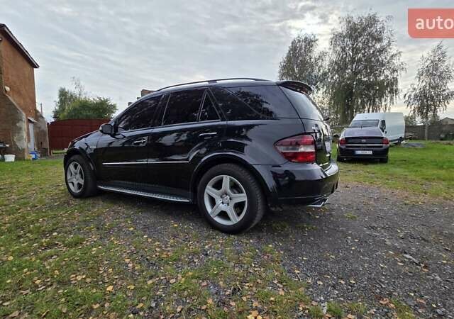 Чорний Мерседес М-Клас, об'ємом двигуна 6.2 л та пробігом 286 тис. км за 10599 $, фото 13 на Automoto.ua