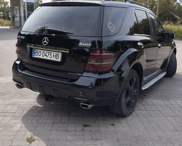 Черный Мерседес М-Класс, объемом двигателя 5.5 л и пробегом 238 тыс. км за 11300 $, фото 3 на Automoto.ua