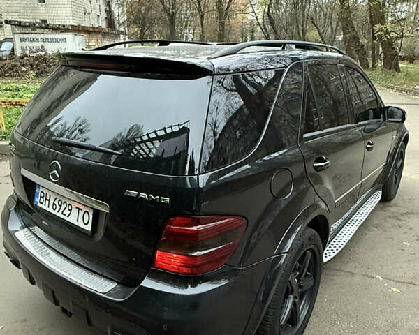 Черный Мерседес М-Класс, объемом двигателя 6.21 л и пробегом 283 тыс. км за 8600 $, фото 3 на Automoto.ua