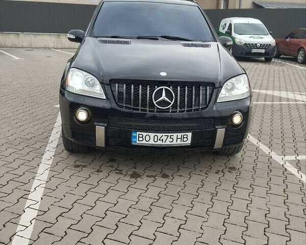 Черный Мерседес М-Класс, объемом двигателя 5.46 л и пробегом 239 тыс. км за 10800 $, фото 9 на Automoto.ua