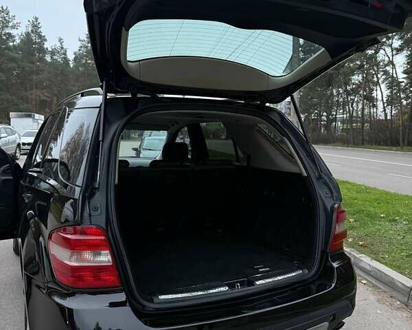 Черный Мерседес М-Класс, объемом двигателя 2.99 л и пробегом 396 тыс. км за 12000 $, фото 10 на Automoto.ua